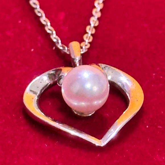 Mikimoto Silver Heart Necklace with Pearl
925 silver made. - Picture 8 of 12